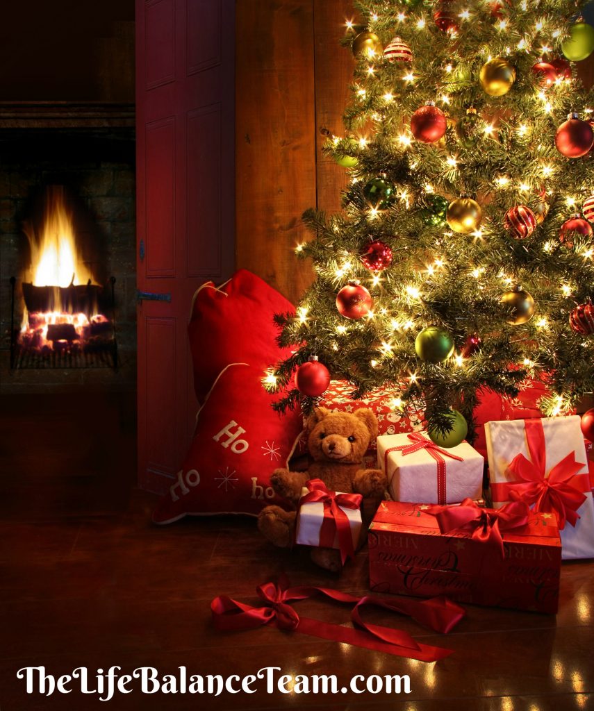 Christmas scene with tree gifts and fire in background-thelifebalanceteam.com